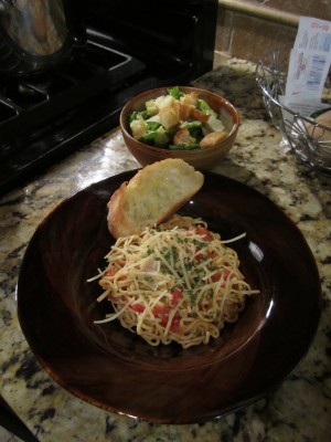 Plated Creamy Tomato Pasta with Caesar Salad