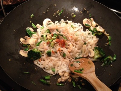 Add noodles to wok